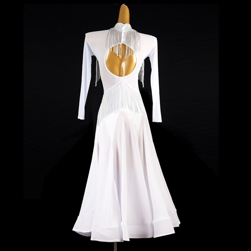 Back view of the white ballroom dress showing the keyhole and fringe