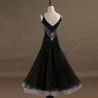 Black ballroom competition dress back view showing the open back