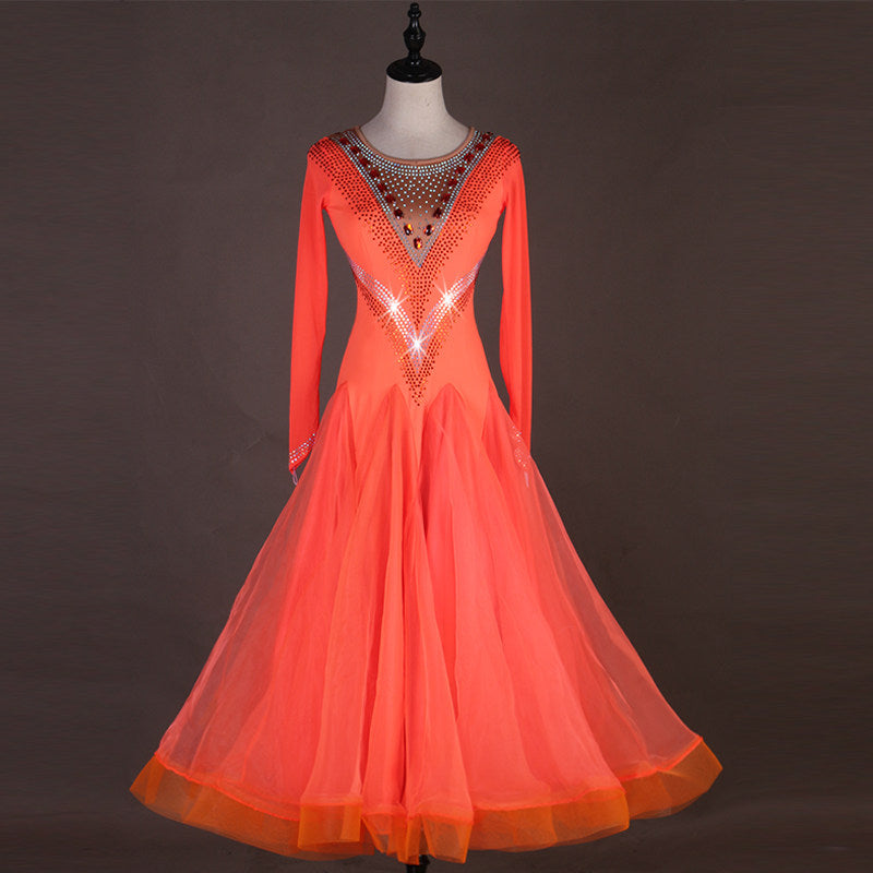 Orange ballroom dance dress with beaded chevron bodice and full swing skirt