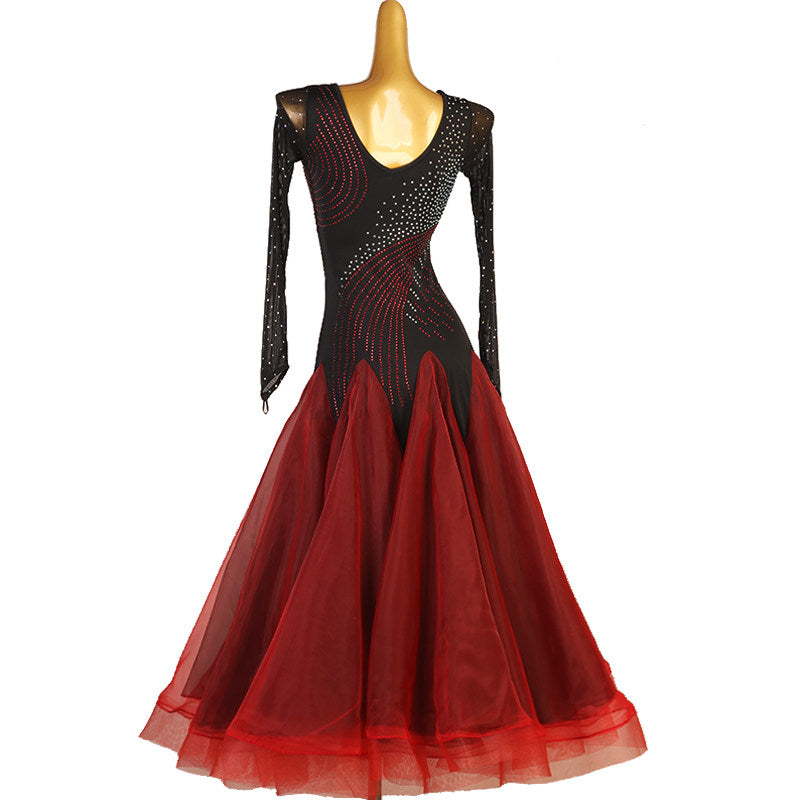 Black and red ballroom dress with the tulle skirt swept out to the side