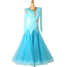 Turquoise ballroom dress with the tulle skirt swept forward