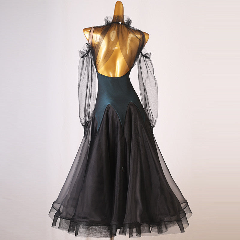 Back view of the teal ballroom dress showing the open back and puff sleeves