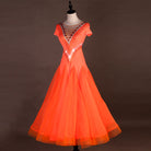 Orange ballroom dance dress front view with full circle organza skirt