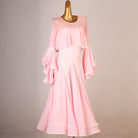 Pink cape ruffle practice dress front view with the godet skirt hanging