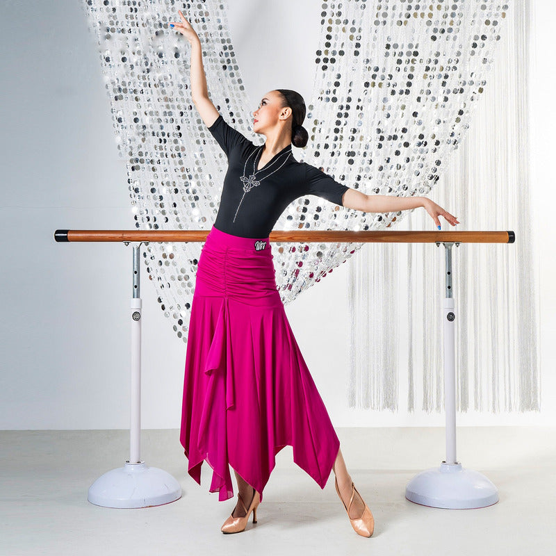 Fuchsia pointed hem ballroom practice skirt swept out through a turn