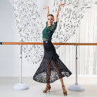 Floral lace godets of the long black ballroom practice skirt lifting through a turn