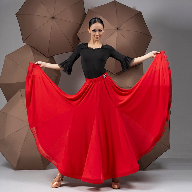 Red full circle chiffon ballroom skirt swept wide through a turn