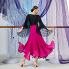 Back view of the fuchsia asymmetric ruffle ballroom dance skirt flaring through a turn