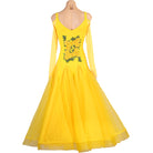 Back view of the yellow ballroom dress showing the embroidery across the back