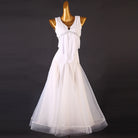 White ballroom dress front view with the draped panel over the tulle skirt