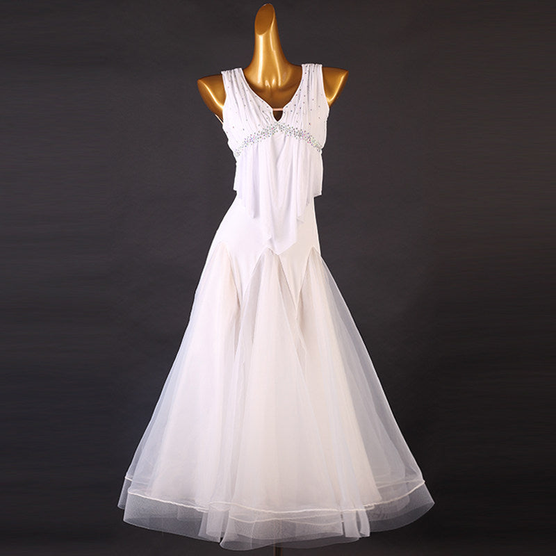 White ballroom dress front view with the draped panel over the tulle skirt