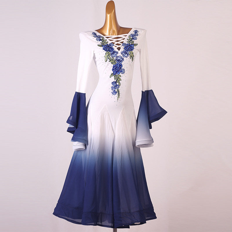 White navy ombre ballroom dress front view with the flounce sleeves hanging