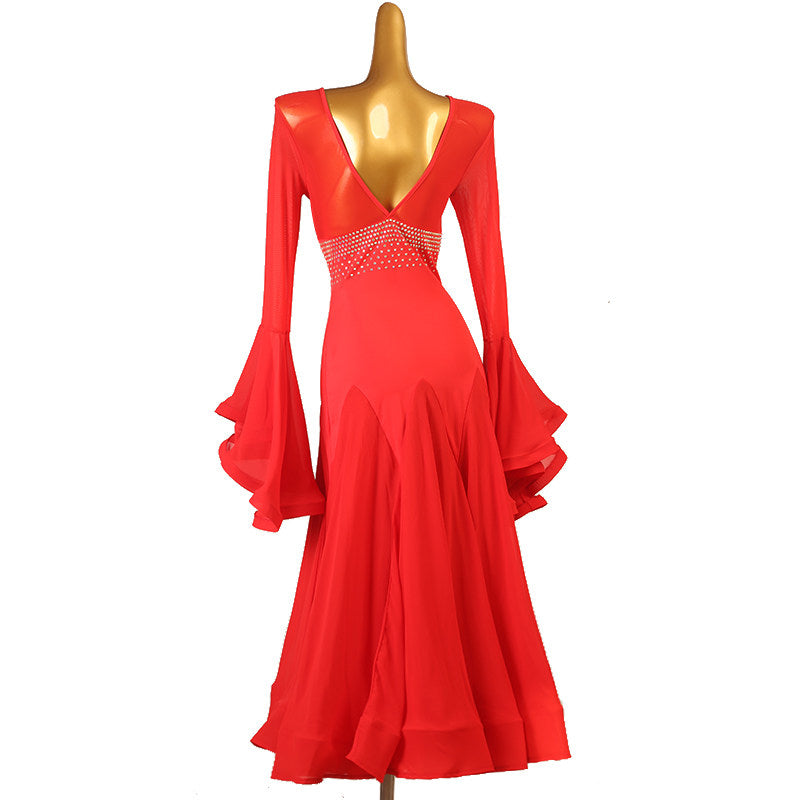 Back view of the red ballroom dress showing the deep V back