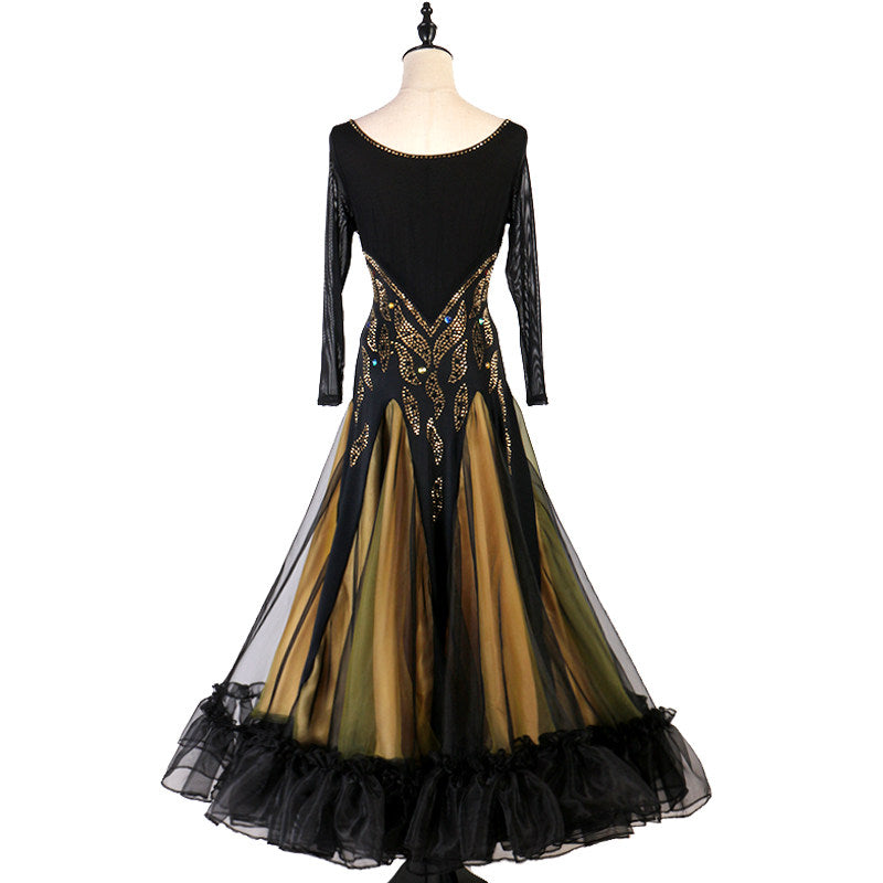 Gold and black ballroom gown three quarter view showing godet panels