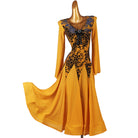 Golden ballroom dance dress with the godet skirt sweeping across the floor