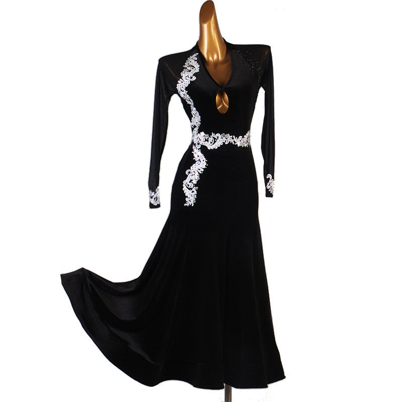 Black velvet ballroom dress with the skirt sweeping out to the side