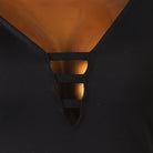 Close up of the three rung ladder trim at the point of the V neckline