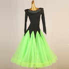 Black and green ballroom dance dress with the fringed mesh sleeves hanging