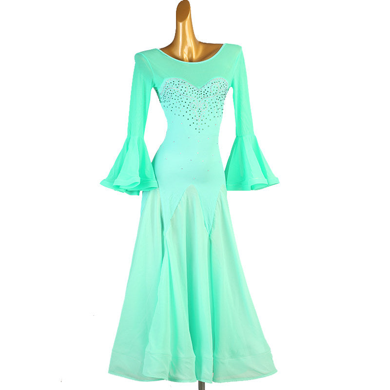 Mint green dance dress front view with the bell sleeves hanging