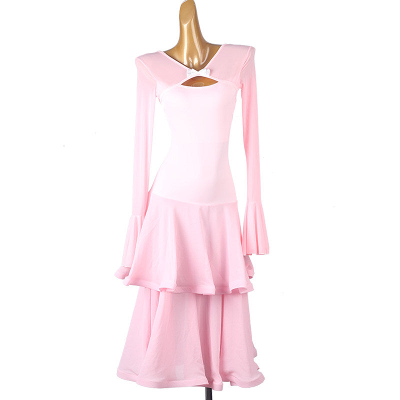 Pink two tier ruffle ballroom dance dress on the mannequin