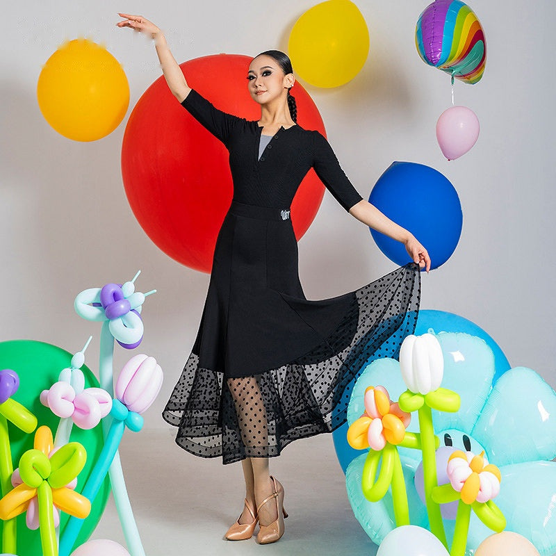 Black dot mesh ballroom dance skirt in motion on the closing step