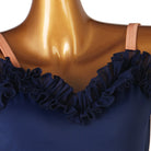 Close up of the double navy ruffle along the sweetheart neckline