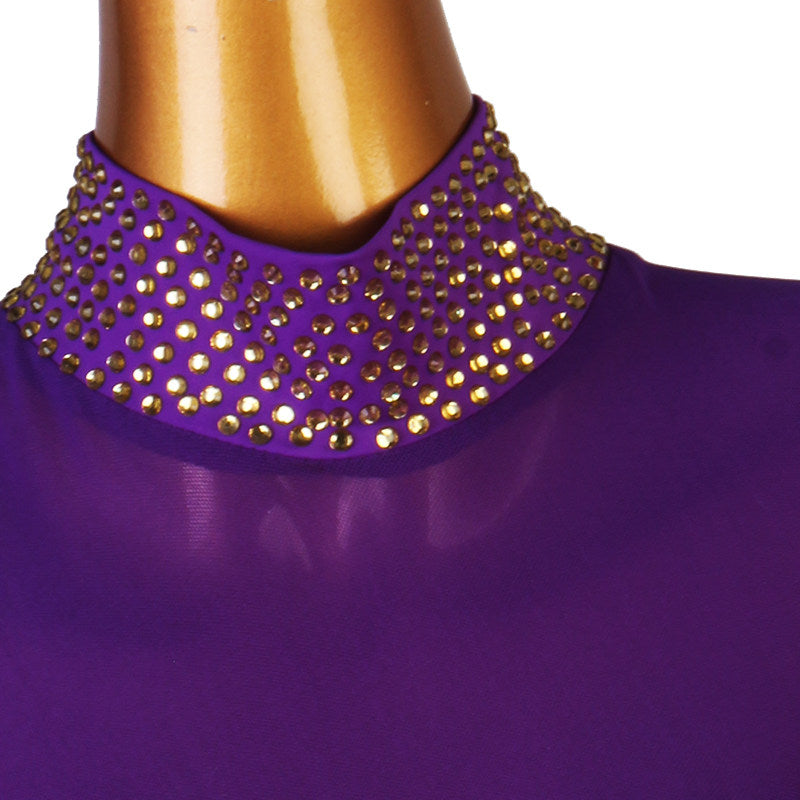 Close up of the gold and clear studs on the purple mock neck collar