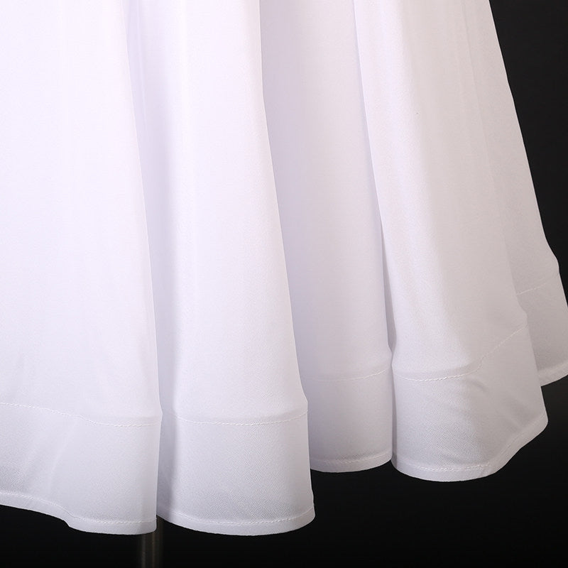 Detail of the banded hem on the white ballroom dance dress