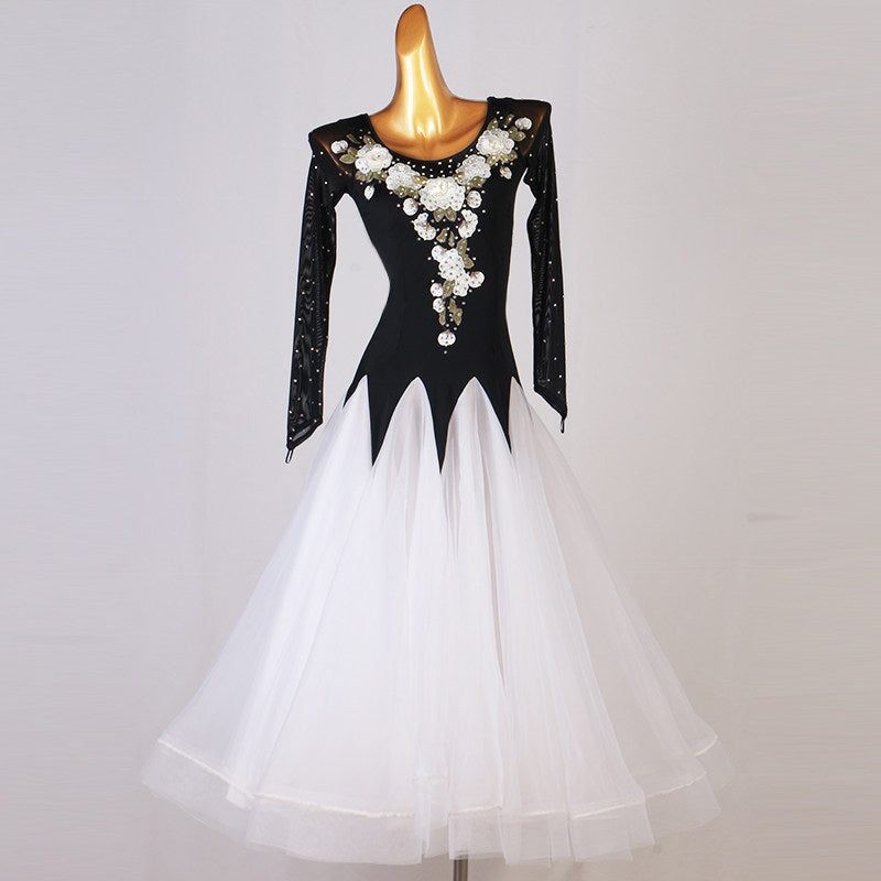 Black and white floral applique ballroom dress with pointed waist panels