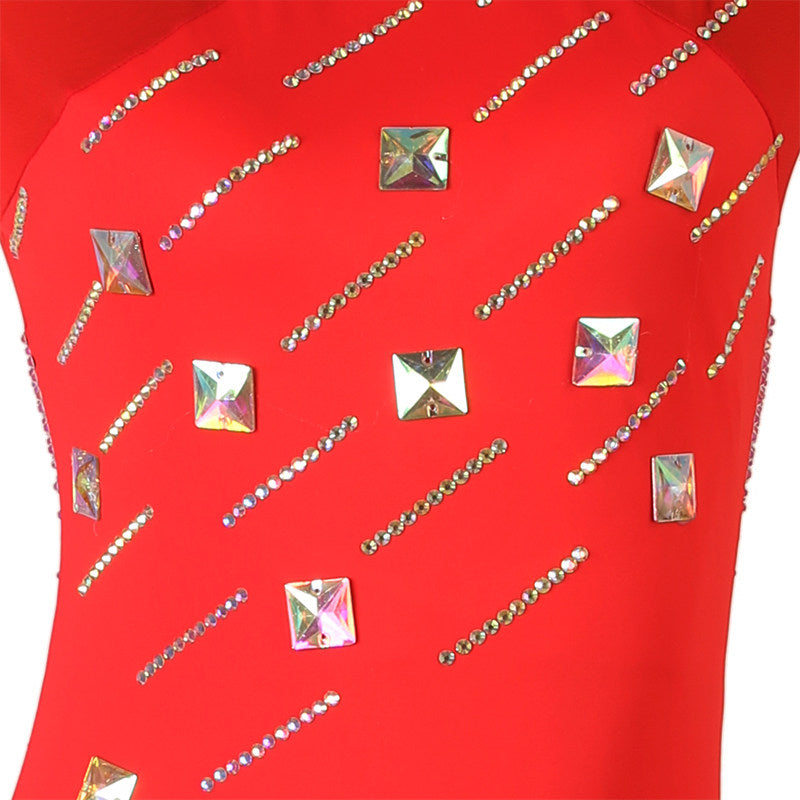 Close up of the square crystals and rhinestone dashes on the red bodice