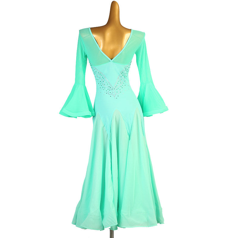 Back view of the mint green ballroom dress showing the V back