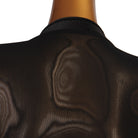 Close up of the sheer mesh back on the black velvet ballroom dress