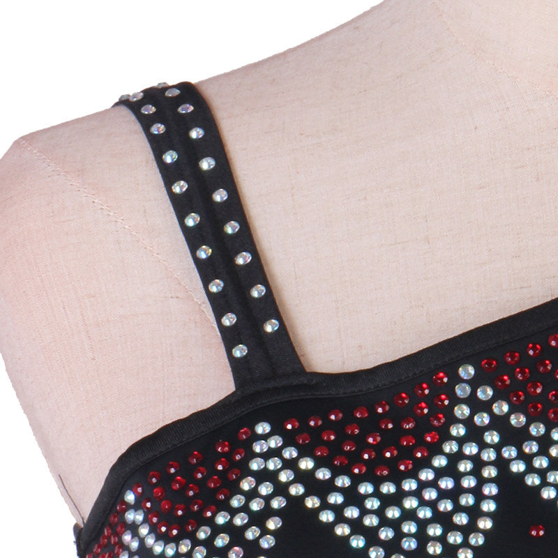 Close up of the rhinestone shoulder strap and beaded bodice edge