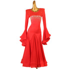 Red ballroom dance dress photographed against a white background