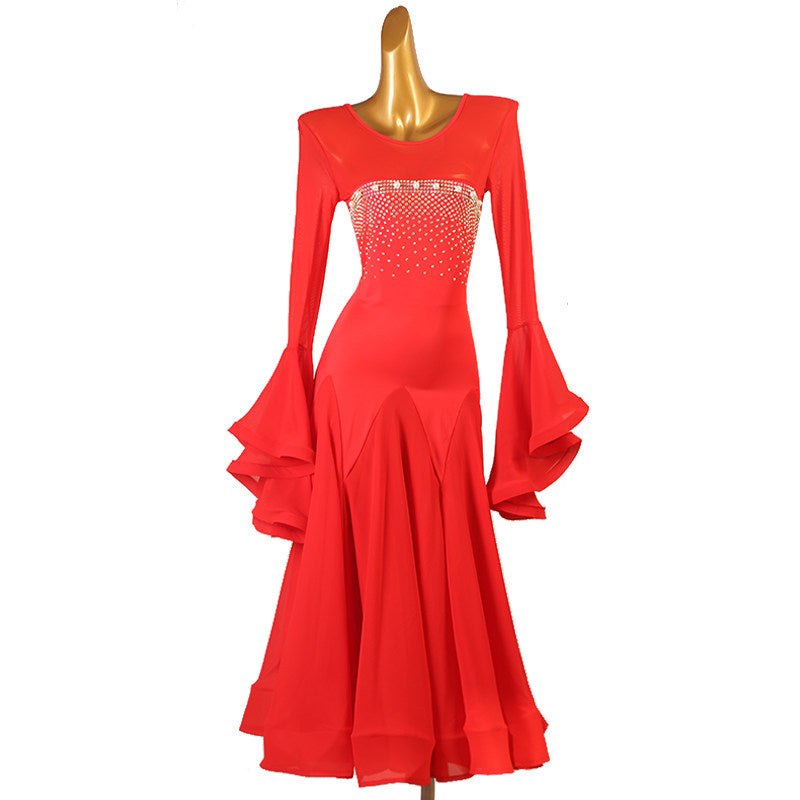 Red ballroom dance dress photographed against a white background