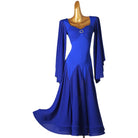 Royal blue ballroom dance dress with the godet skirt swept to the side
