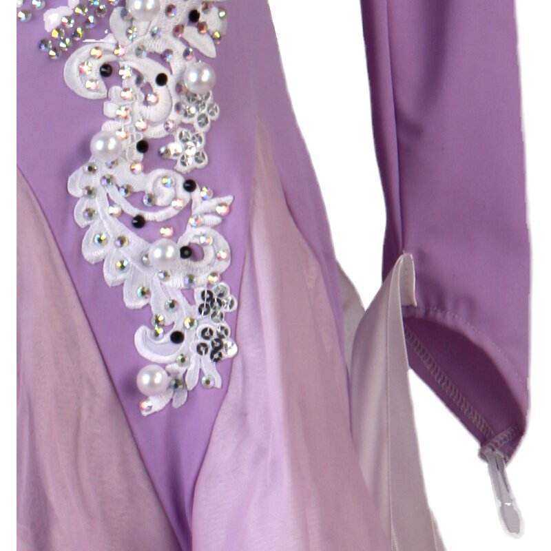 Close up of the pearls and jet stones on the ivory lace applique