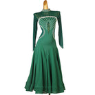 Dark green ballroom competition dress with the godet skirt swept to the side