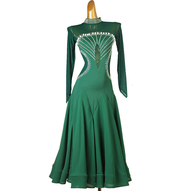 Dark green ballroom competition dress with the godet skirt swept to the side