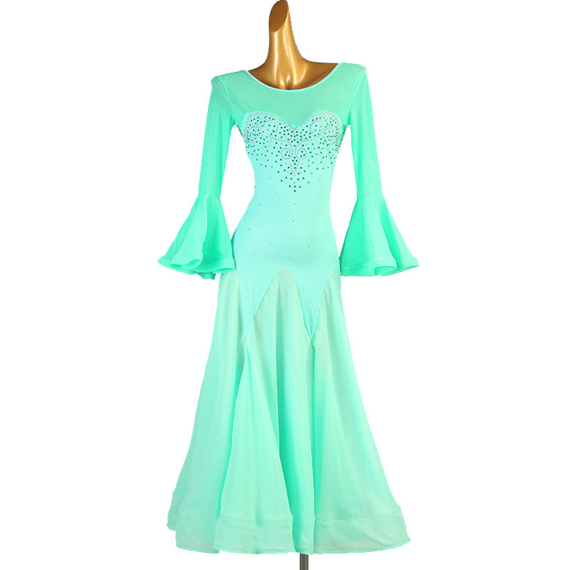 Mint green ballroom competition dress photographed straight on