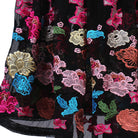 Close up of the multicolour floral embroidery on the skirt border