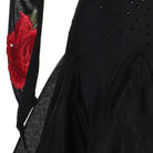 Close up of the red rose applique and rhinestones on black mesh