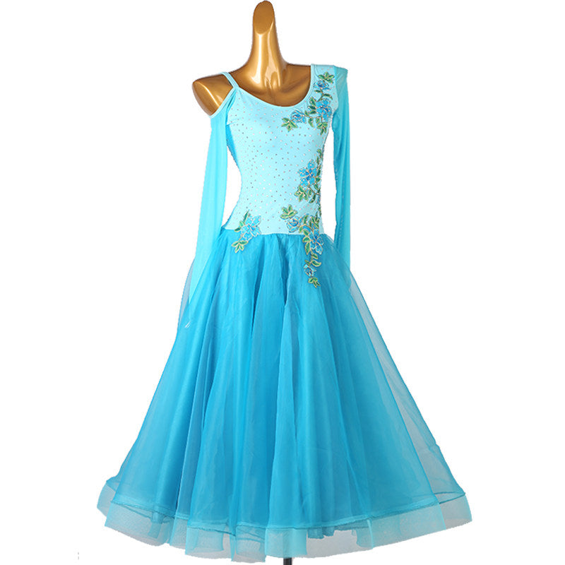 Turquoise organza ballroom dance dress photographed from the front