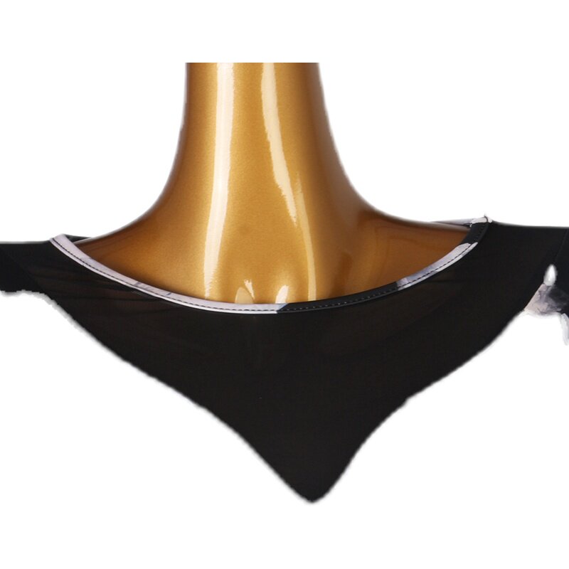 Close up of the low V back edge on the black floral ballroom dress
