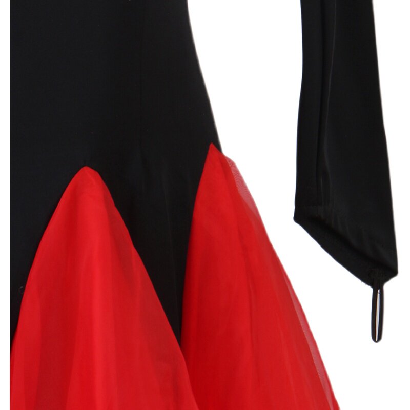 Detail of the black chevron points over the red tulle skirt