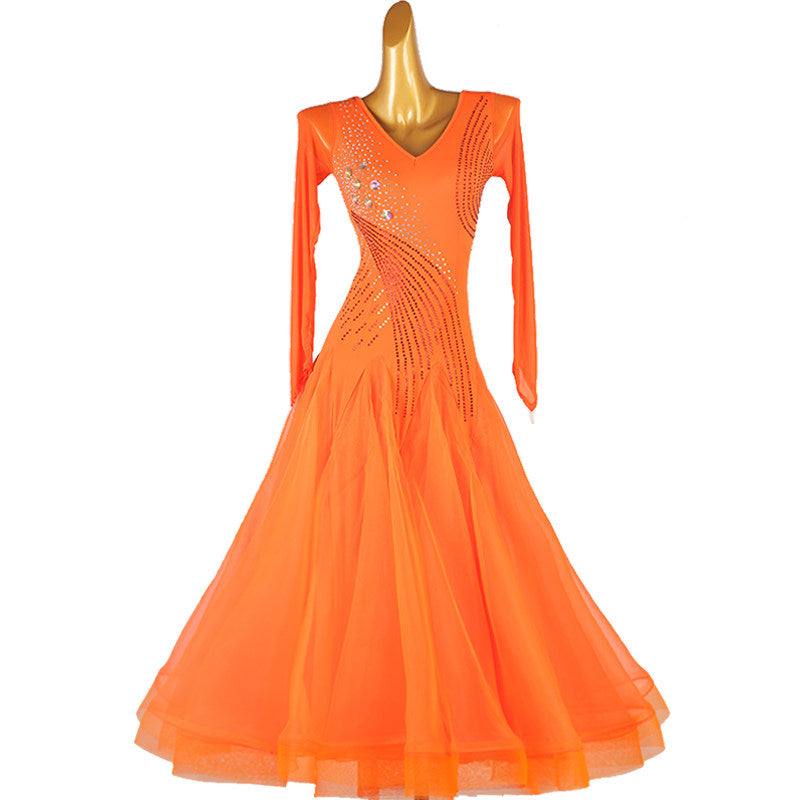 Orange ballroom dance dress with the tulle skirt hanging straight