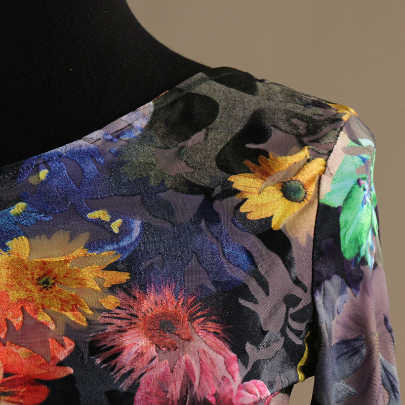 Close detail of the dark floral print fabric on the bodice