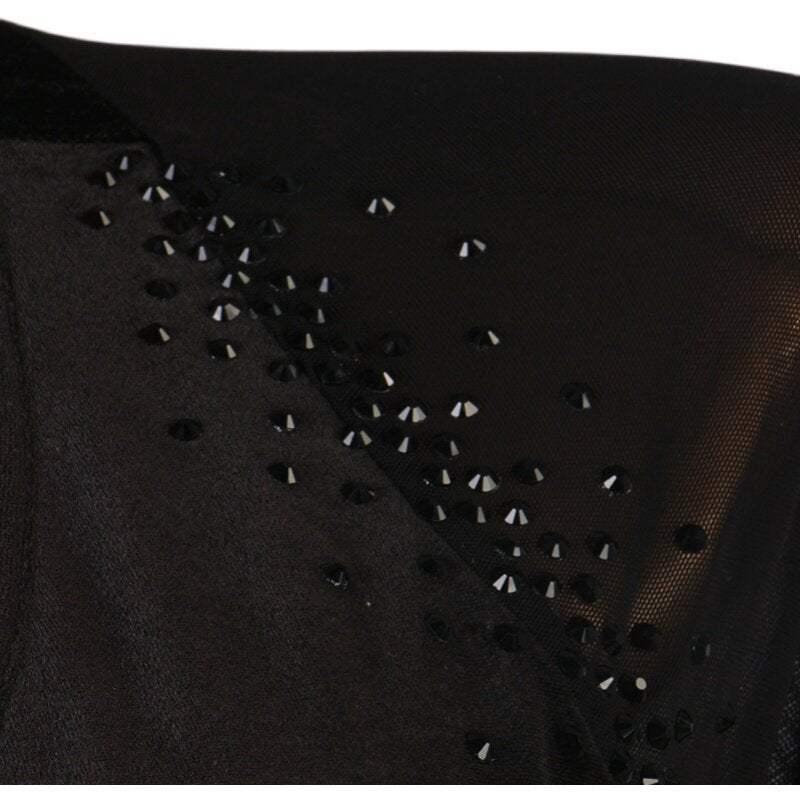 Detail of the scattered rhinestones along the applique on the velvet bodice