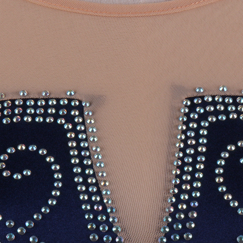 Silver bead scroll embroidery detail on the navy velvet bodice