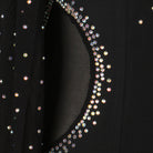 Rhinestone detail on the black velvet bodice neckline of the ballroom gown